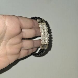 Elegant Black and White Beaded Bracelet With Braided Leather